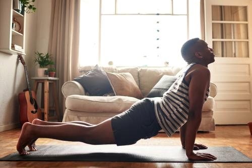 young man doing yoga