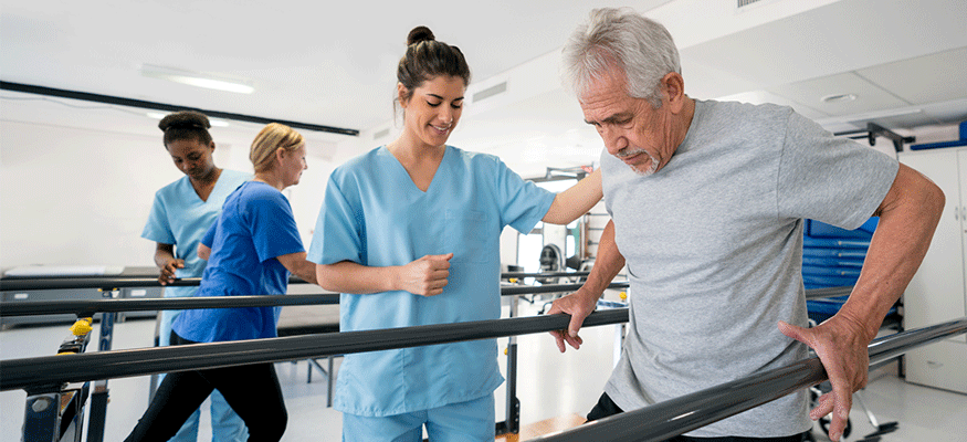 An older man receiving rehabilitation services