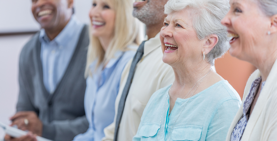 A group of older adults in a class