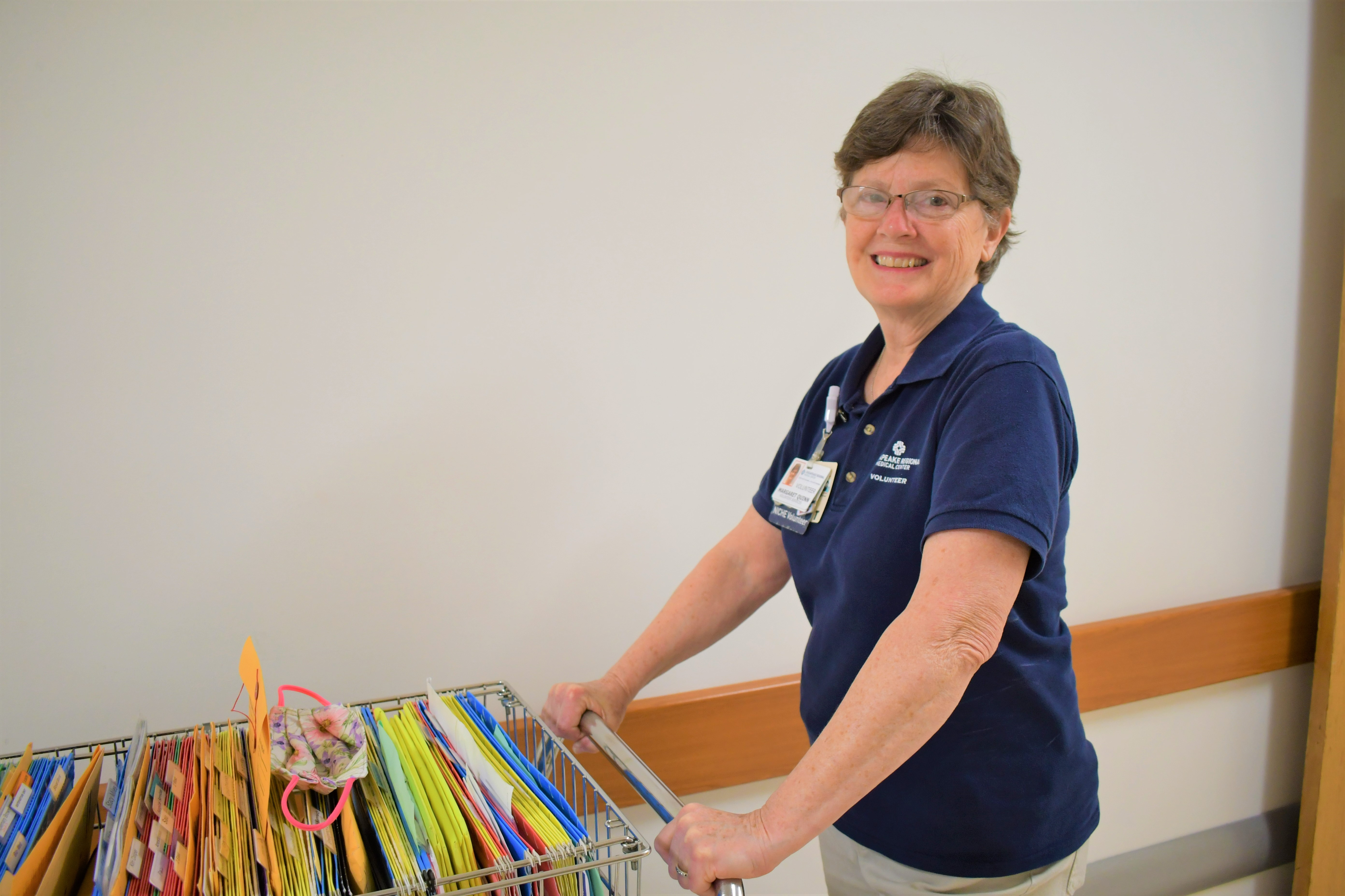 Volunteer making deliveries throughout hospital