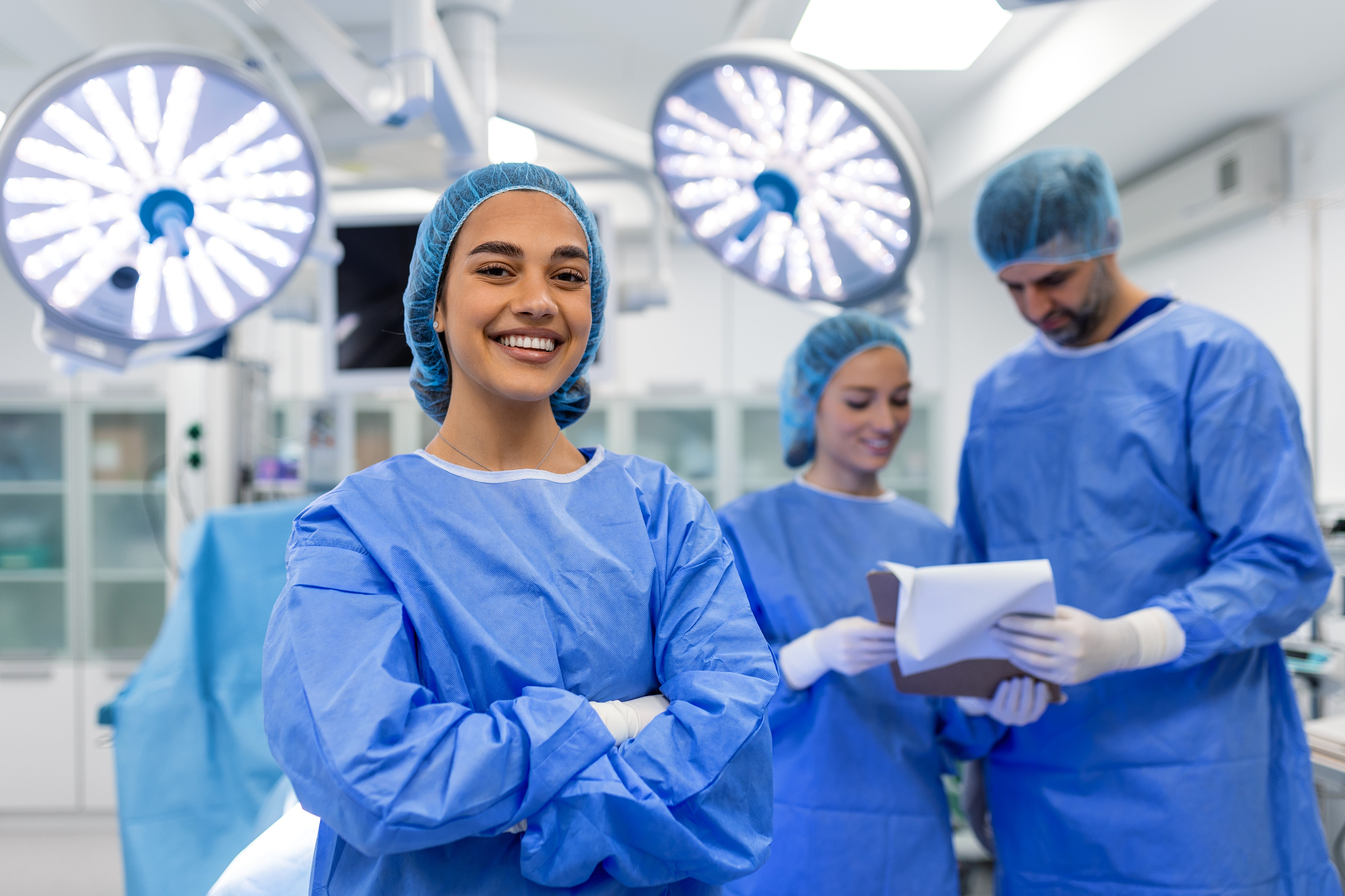 Students and surgeon in operating room