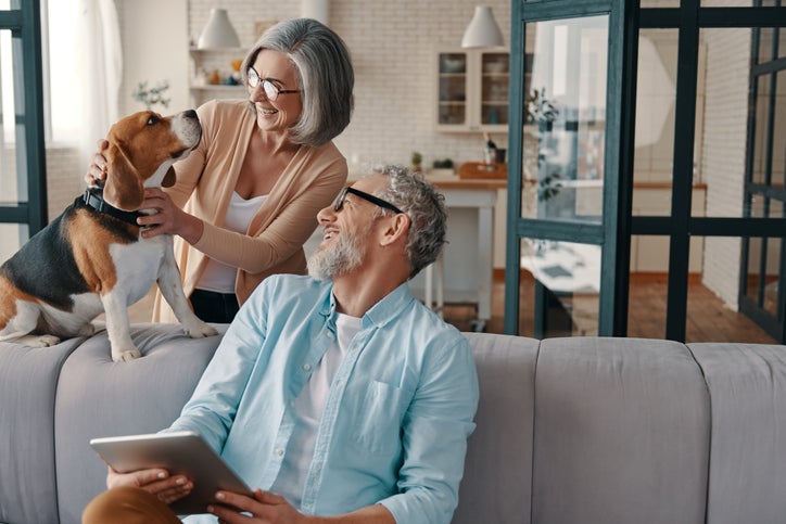 couple in their 50's and dog