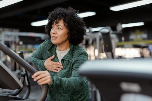 Middle aged woman having heart pain.