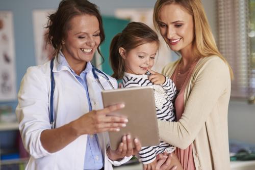 Mom and child with doctor