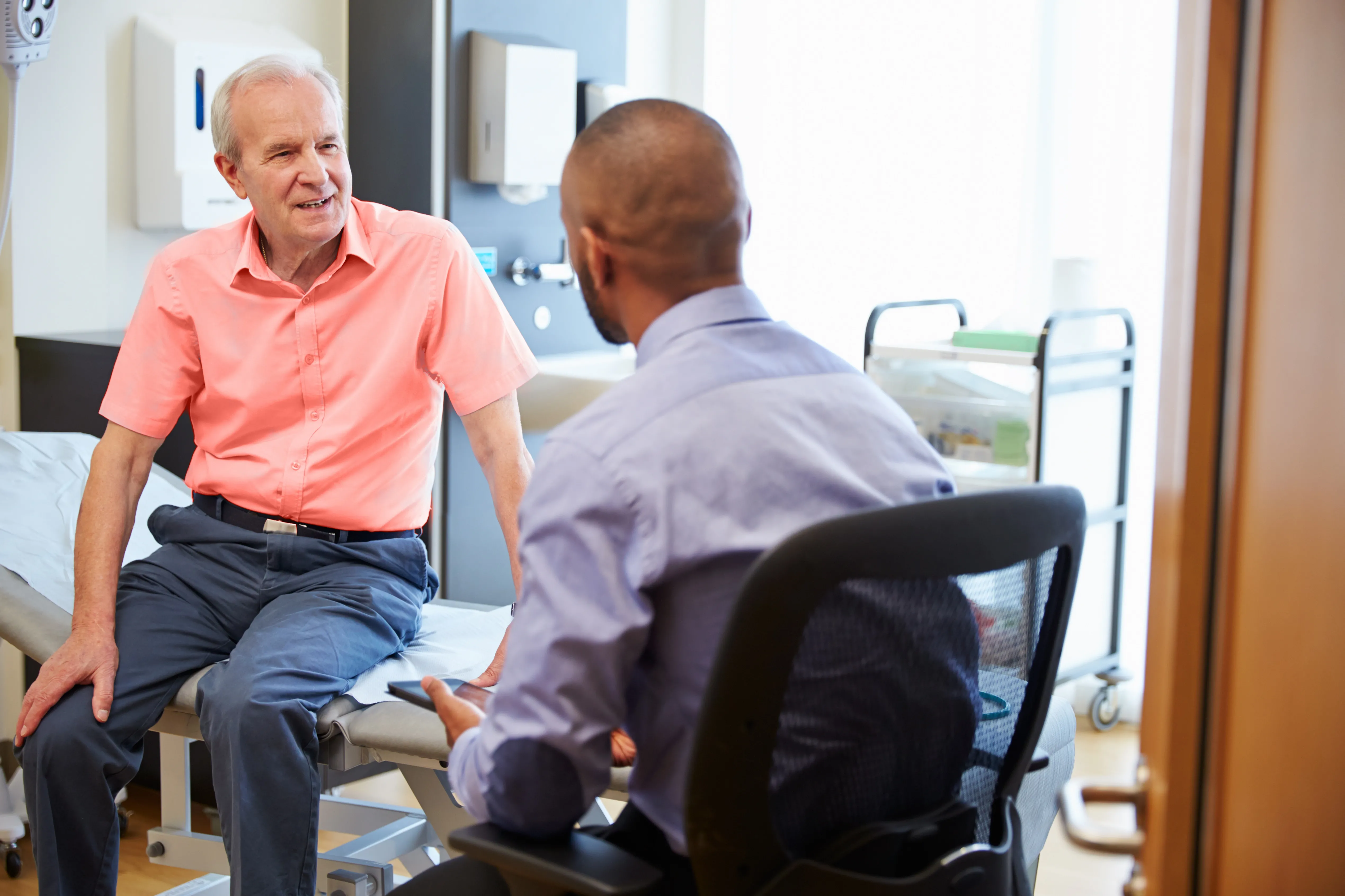 man talking to doctor