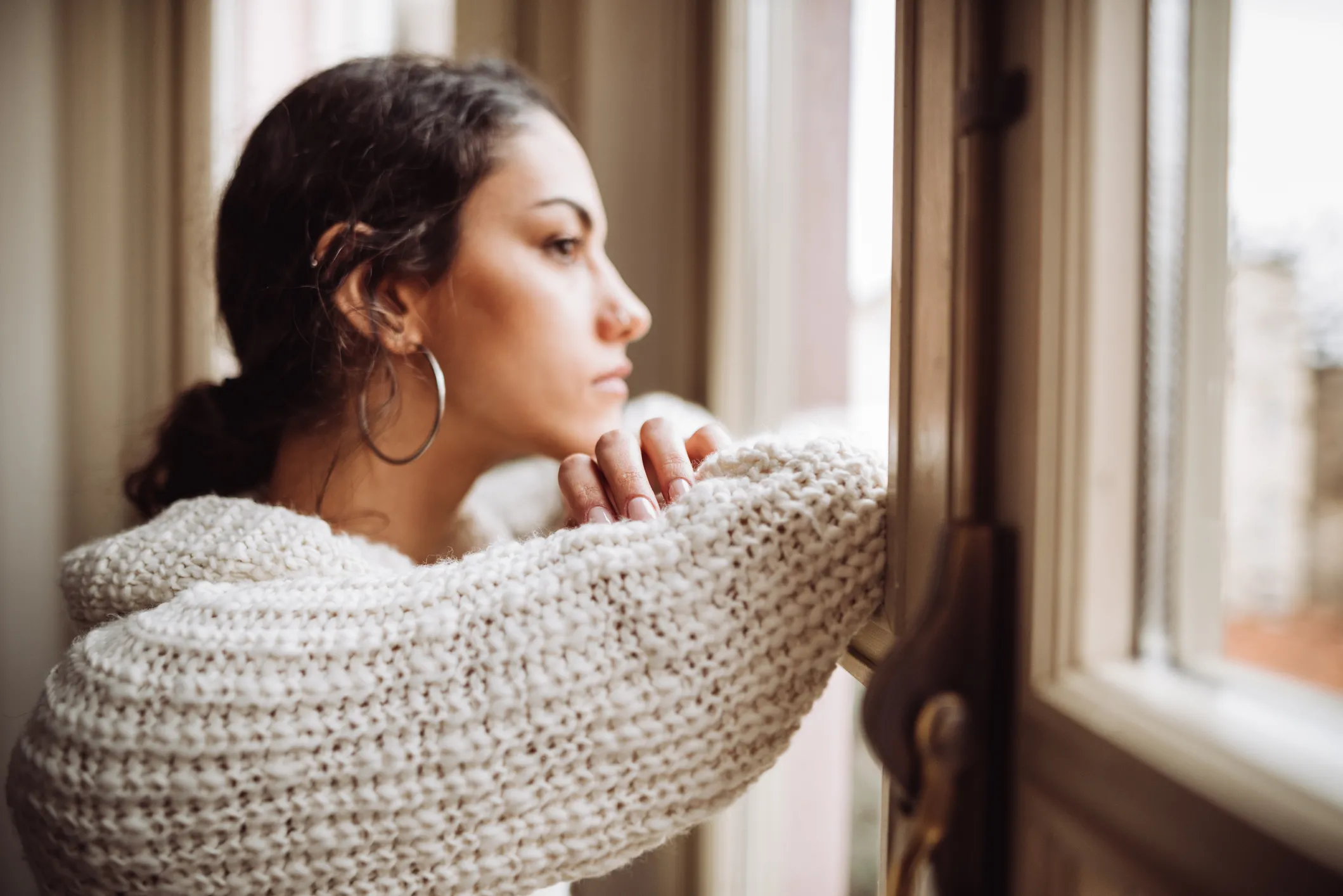 woman looking outside