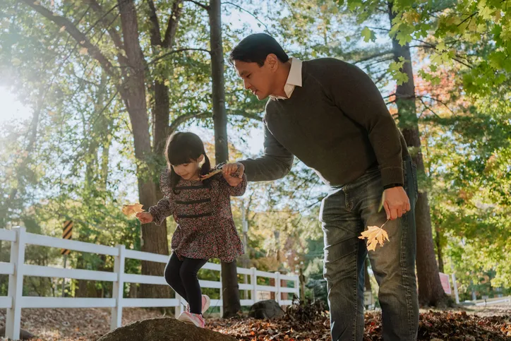 father and son playing