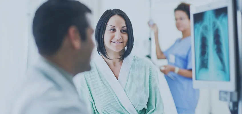 woman receiving lung cancer screening