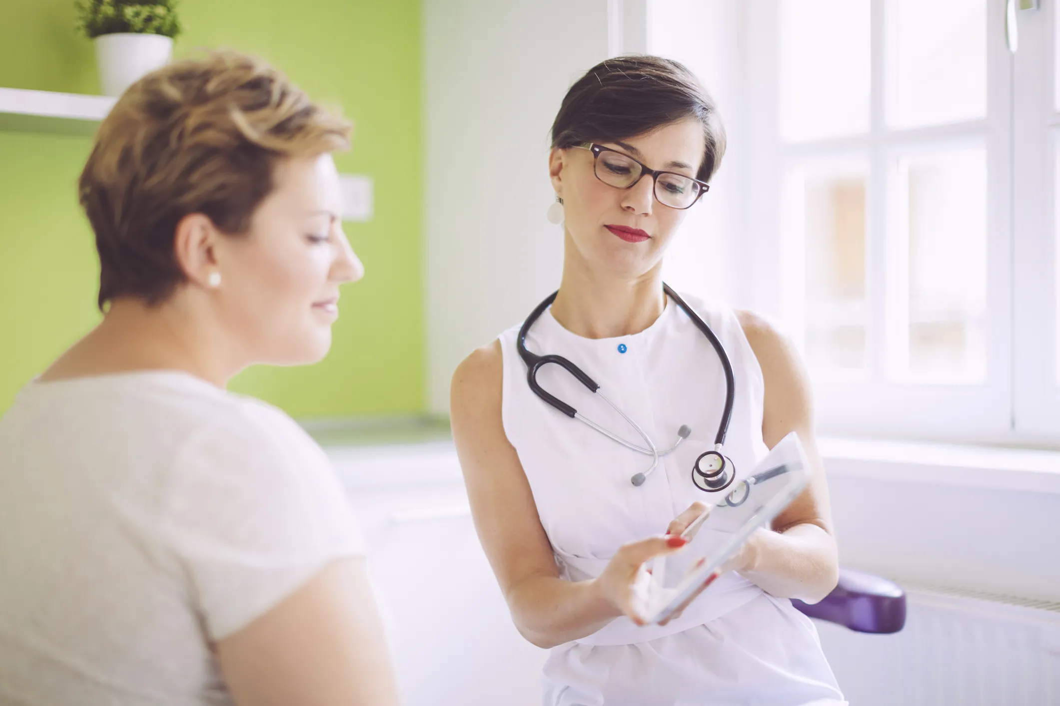 patient talking to doctor