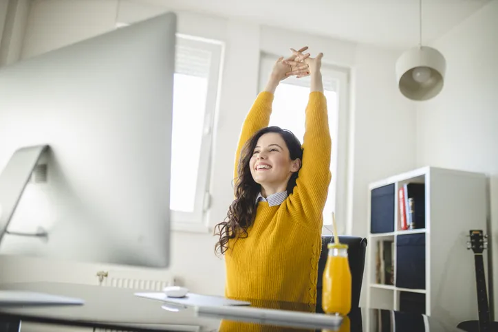 woman stretching in the office