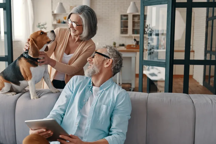 a couple with their dog