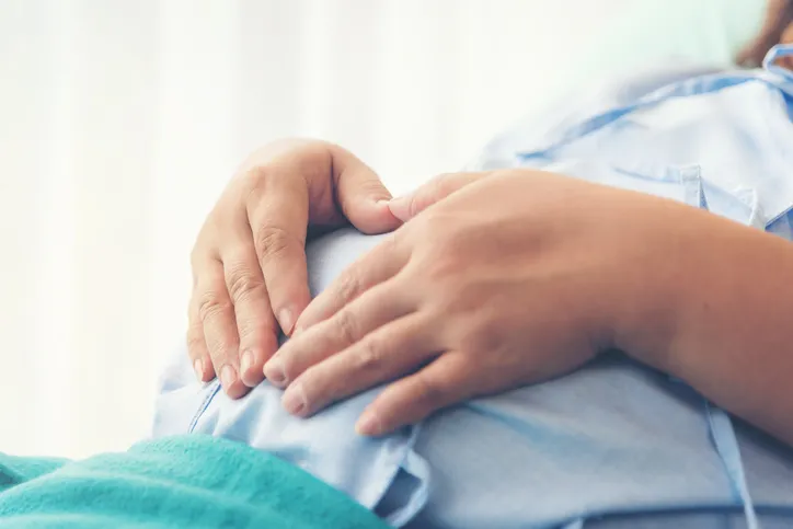 pregnant woman in bed at hospital