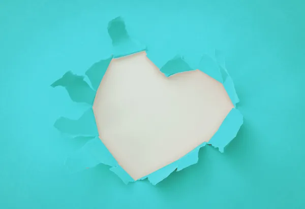 teal heart with rip