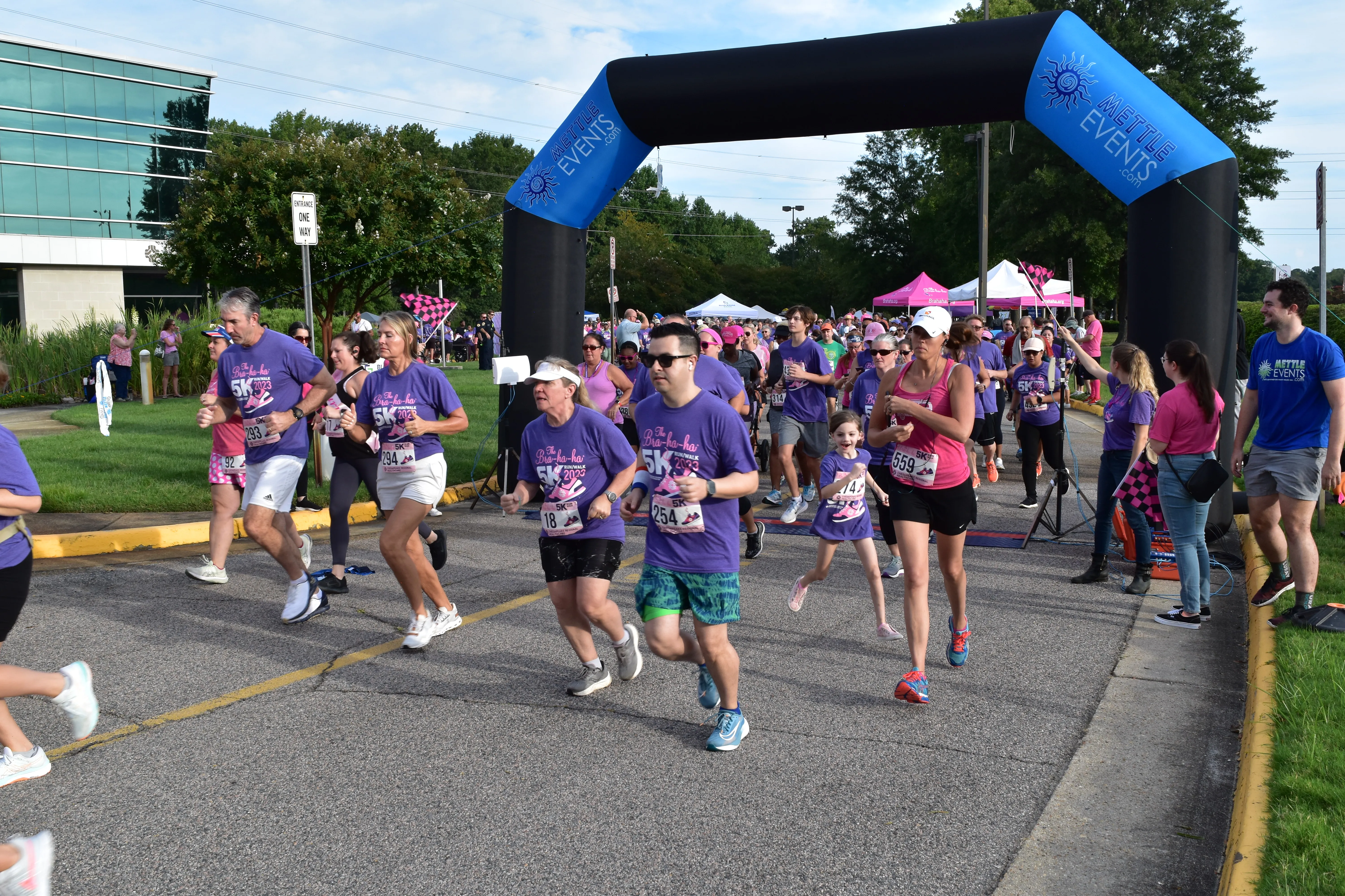 Runners begin running the 5K race