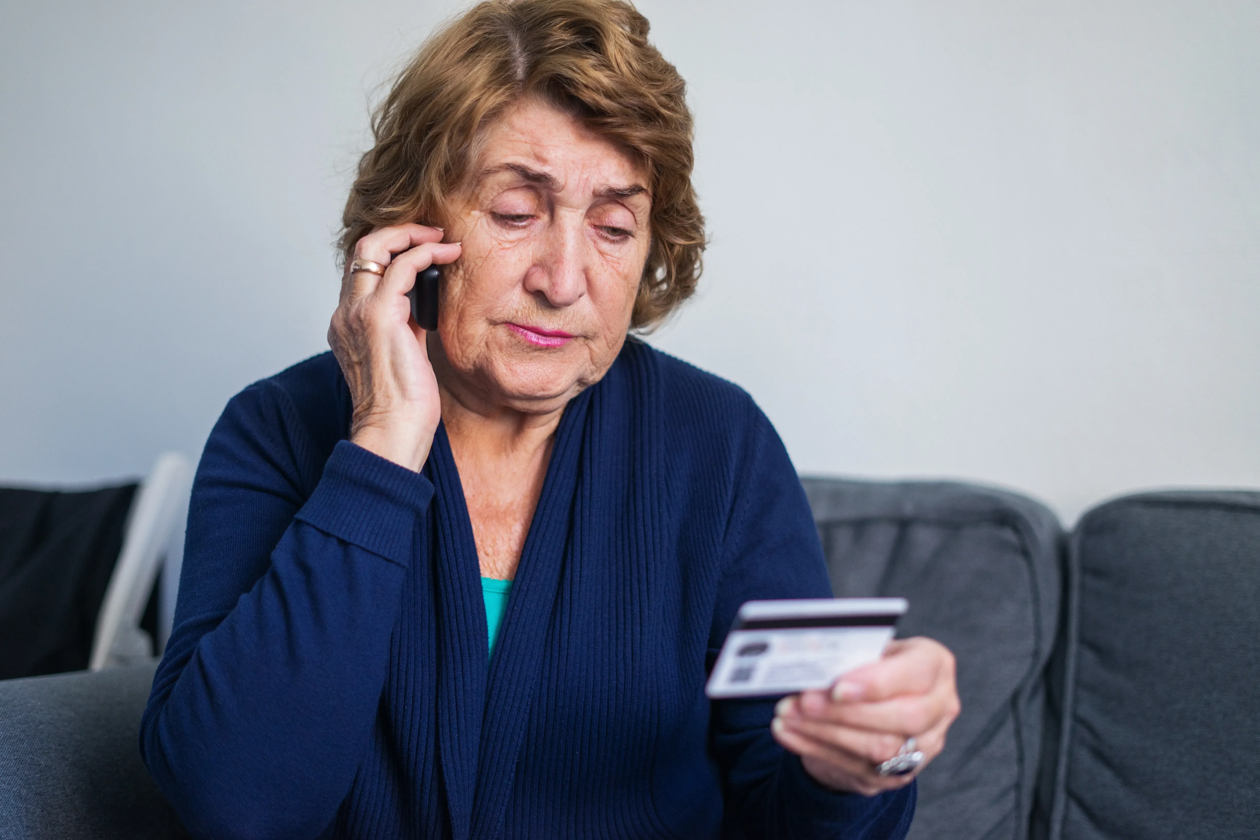 Woman holding credit card