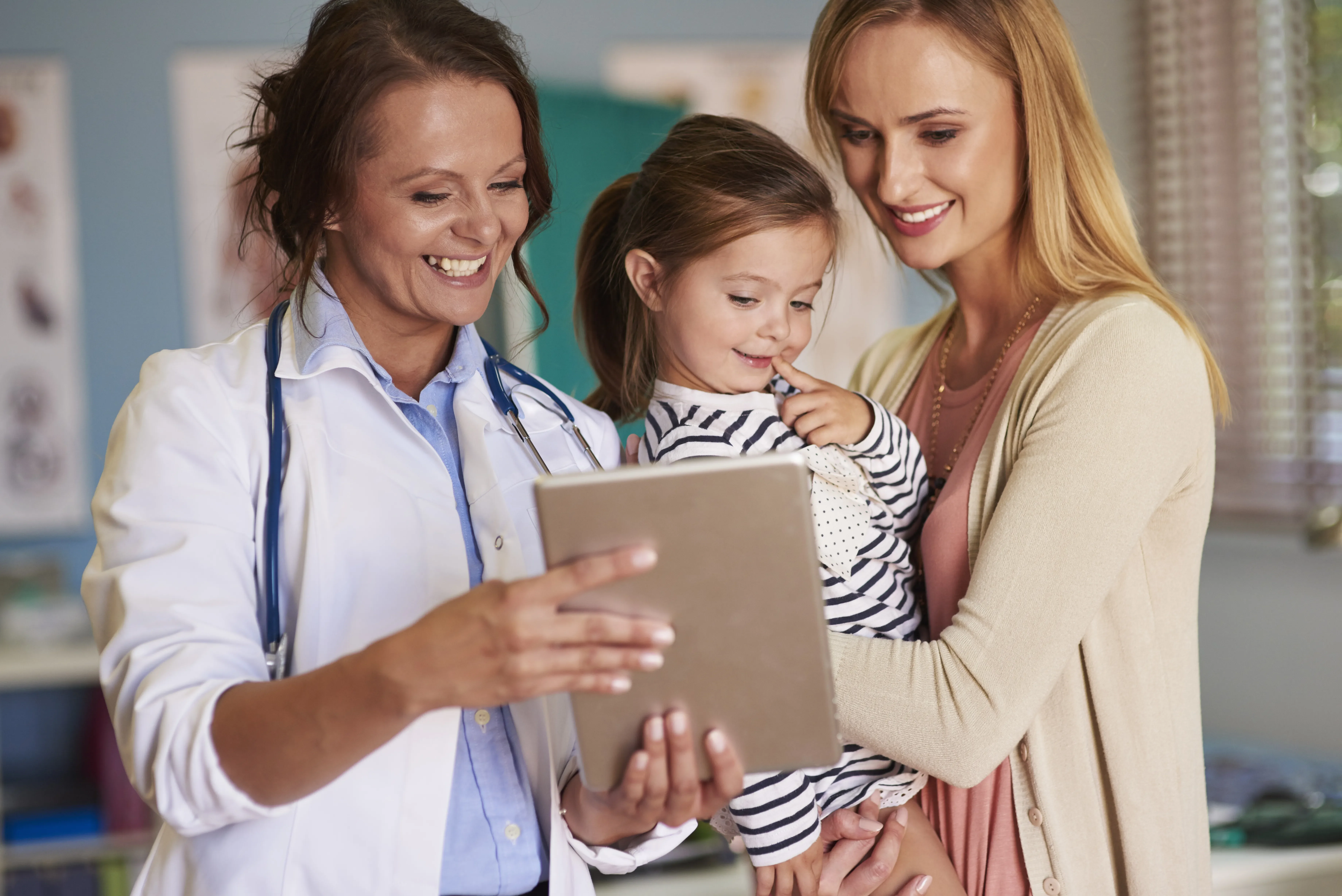 Mom and child with doctor